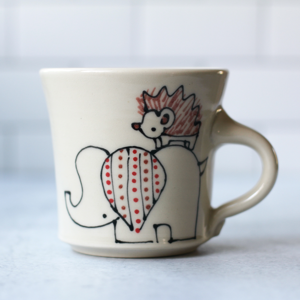 elephant hedgehog mug