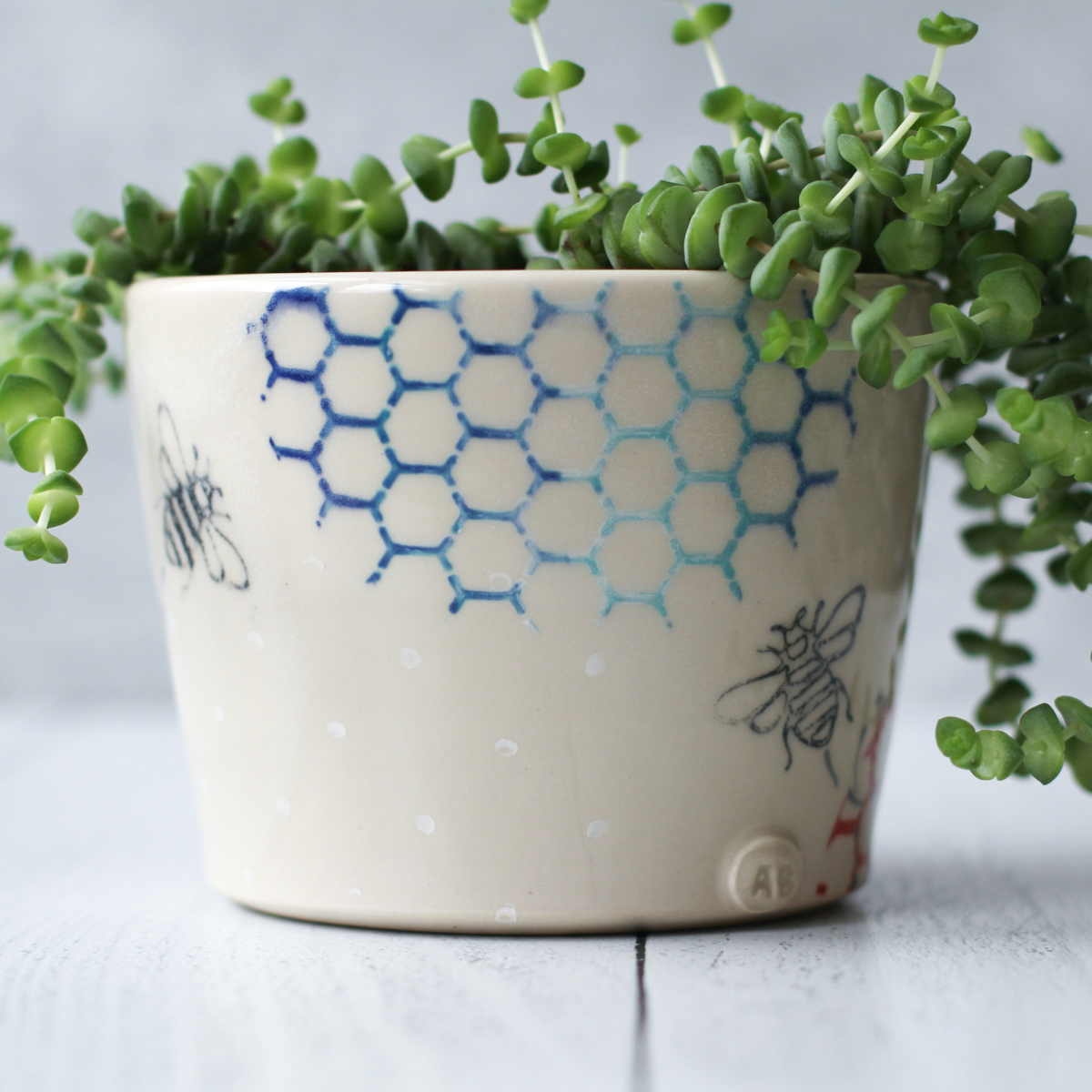 bee and honeycomb planter